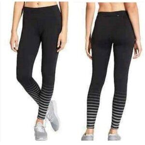 Athleta Women's Shine Stripe Sonar Tight in Black size Small